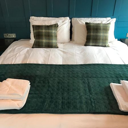 No.16 Hotel Seaham Phòng bức ảnh A bed with a bed runner